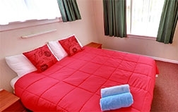 one bedroom unit with one queen bed and one single bed