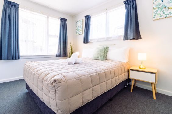 Comfortable bedroom area in the One-Bedroom Superior unit at Belle Bonne Motel Christchurch