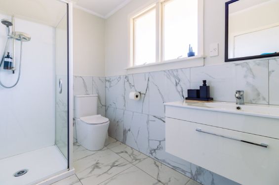 Modern newly renovated bathroom in the One-Bedroom Superior unit at Belle Bonne Motel Christchurch