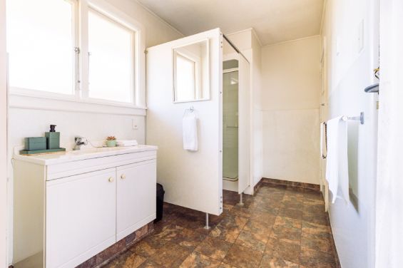 Bathroom with shower in the Two-Bedroom Standard unit at Belle Bonne Motel Christchurch