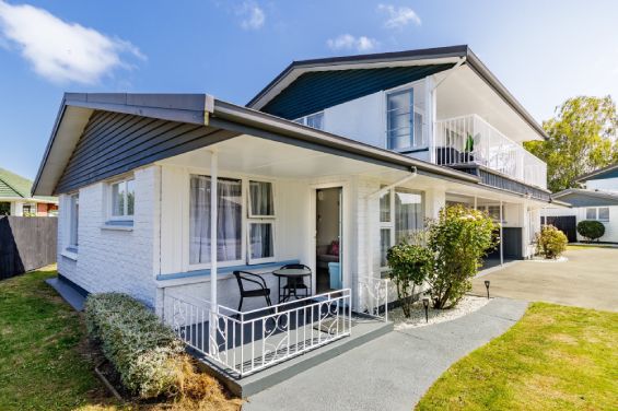 Scenic garden patio access from the Two-Bedroom Garden unit at Belle Bonne Motel Christchurch