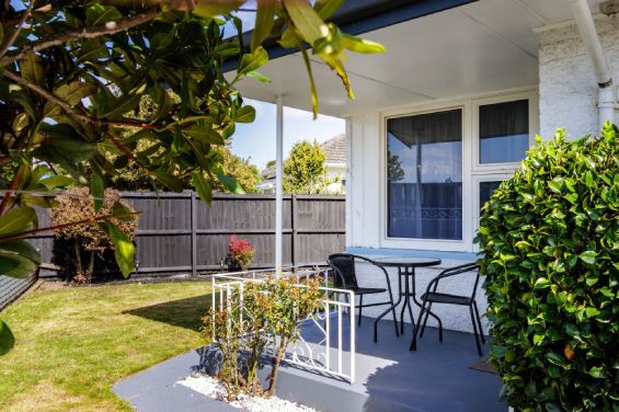 Scenic garden patio access from the Two-Bedroom Garden unit at Belle Bonne Motel Christchurch